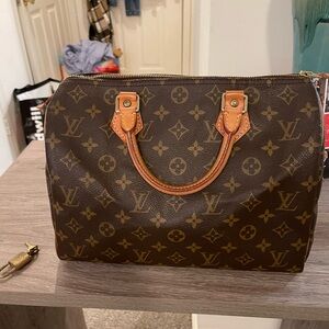 Louis Vuitton Classic Monogram Satchel This bag is authentic and is in new condt